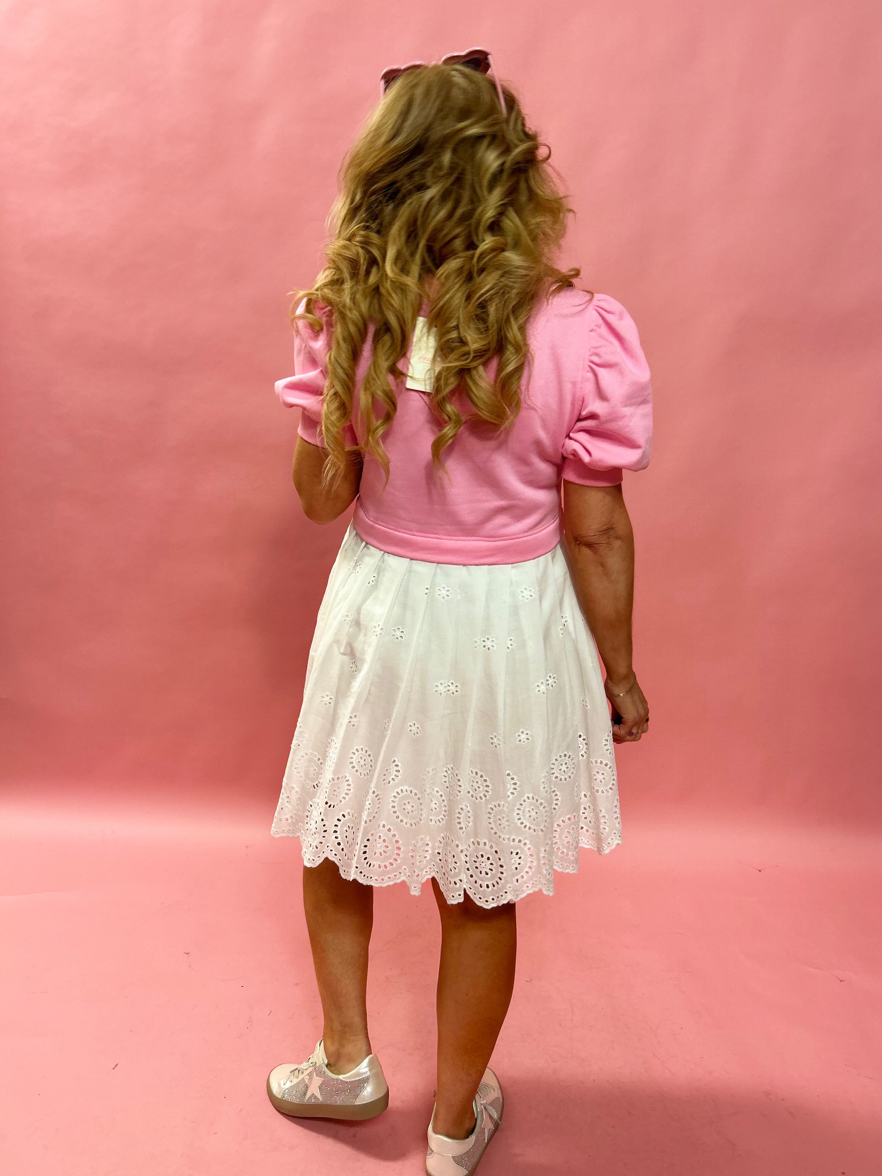 Rose Whimsy: Pink Sweater Dress with Eyelet Embroidered Hem