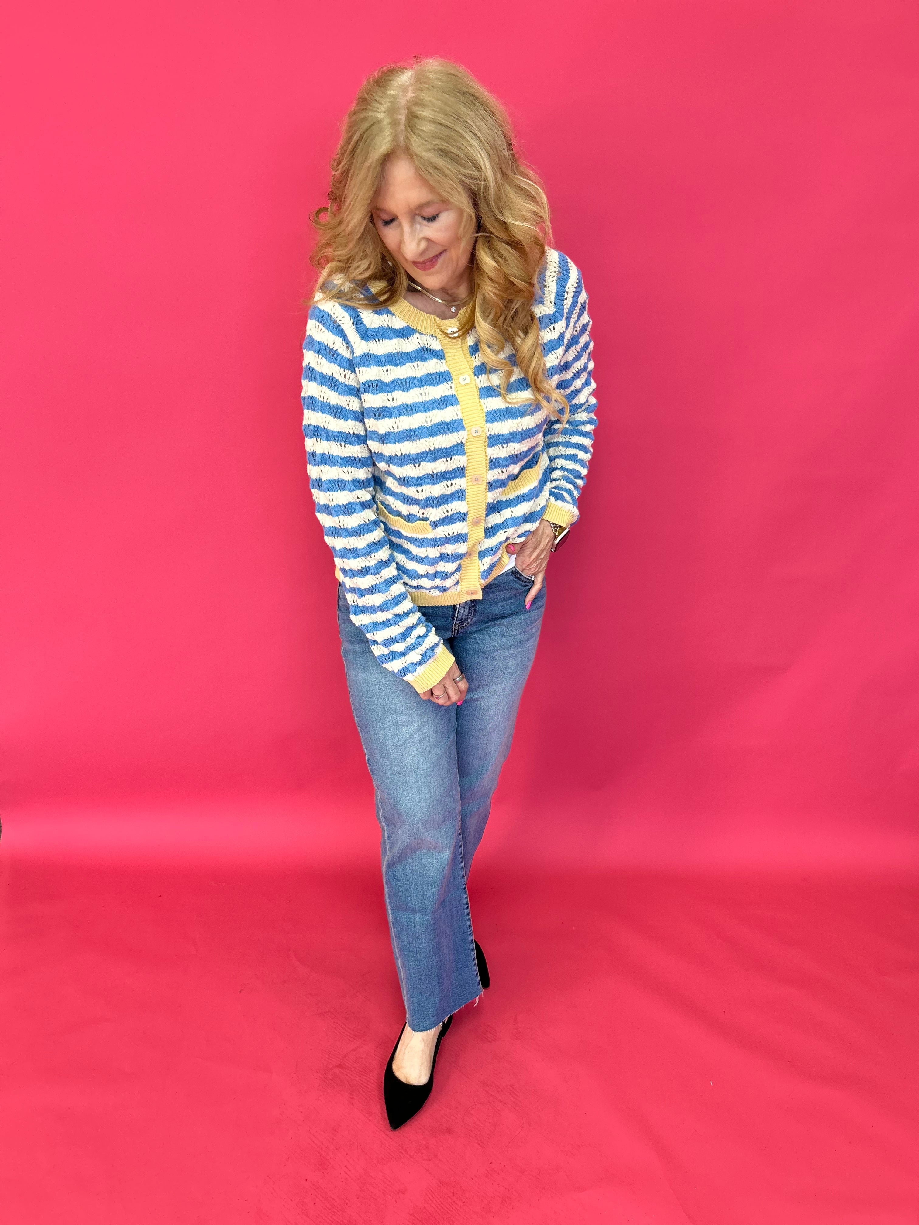 Side view of the easy straight jeans showing the 31 inch inseam and vintage medium wash