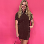 Woman wearing a bark brown mineral washed button front mini shirt dress with sneakers