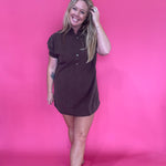 Side view showing the mini length and soft drape of the bark brown shirt dress