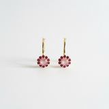 Antique gold hoop earrings covered in petal pink crystals measuring an inch and a half