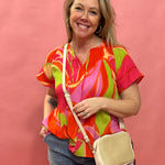 Bloom & Flow: Bright Floral Mini Pleat Tie-Front Blouse