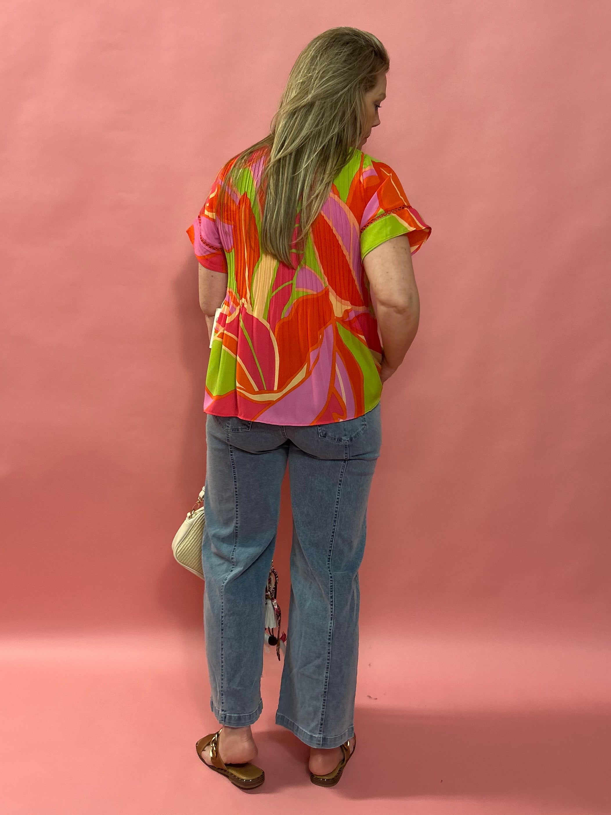 Bloom & Flow: Bright Floral Mini Pleat Tie-Front Blouse