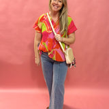 Bloom & Flow: Bright Floral Mini Pleat Tie-Front Blouse