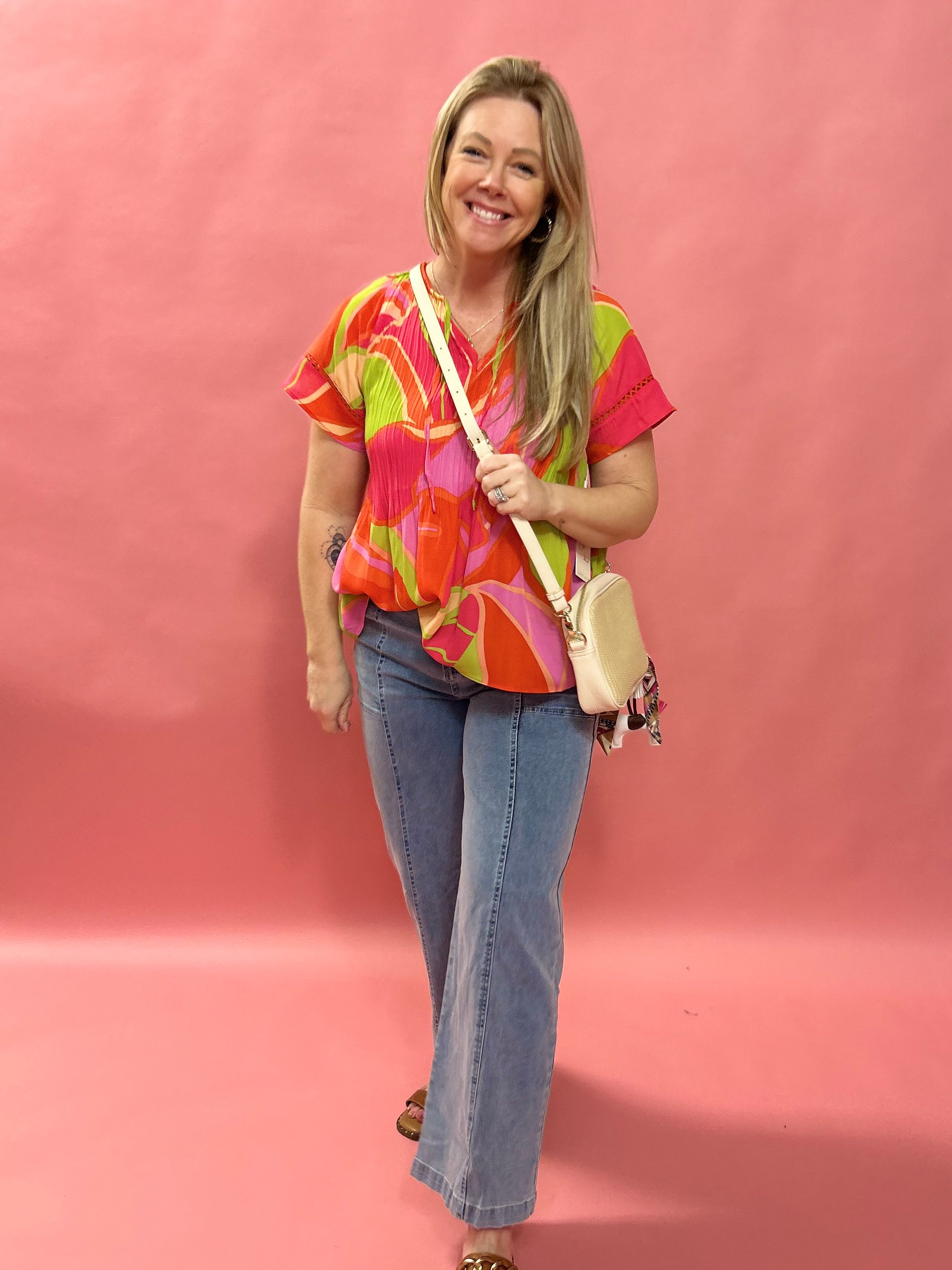 Bloom & Flow: Bright Floral Mini Pleat Tie-Front Blouse