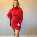 Full length view of the red sleeveless sweater dress styled on its own without layers