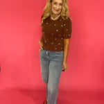 Cocoa brown polka dot cardigan styled buttoned over trousers for an office-ready fall look