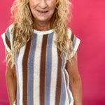 Side view showing the drop shoulder seam and short sleeve on the striped knit top