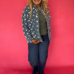 Back view of the light denim polka dot jacket showing the relaxed oversized cut and classic collar