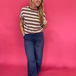 Side view showing the half sleeves and relaxed oversized body of the striped cotton tee
