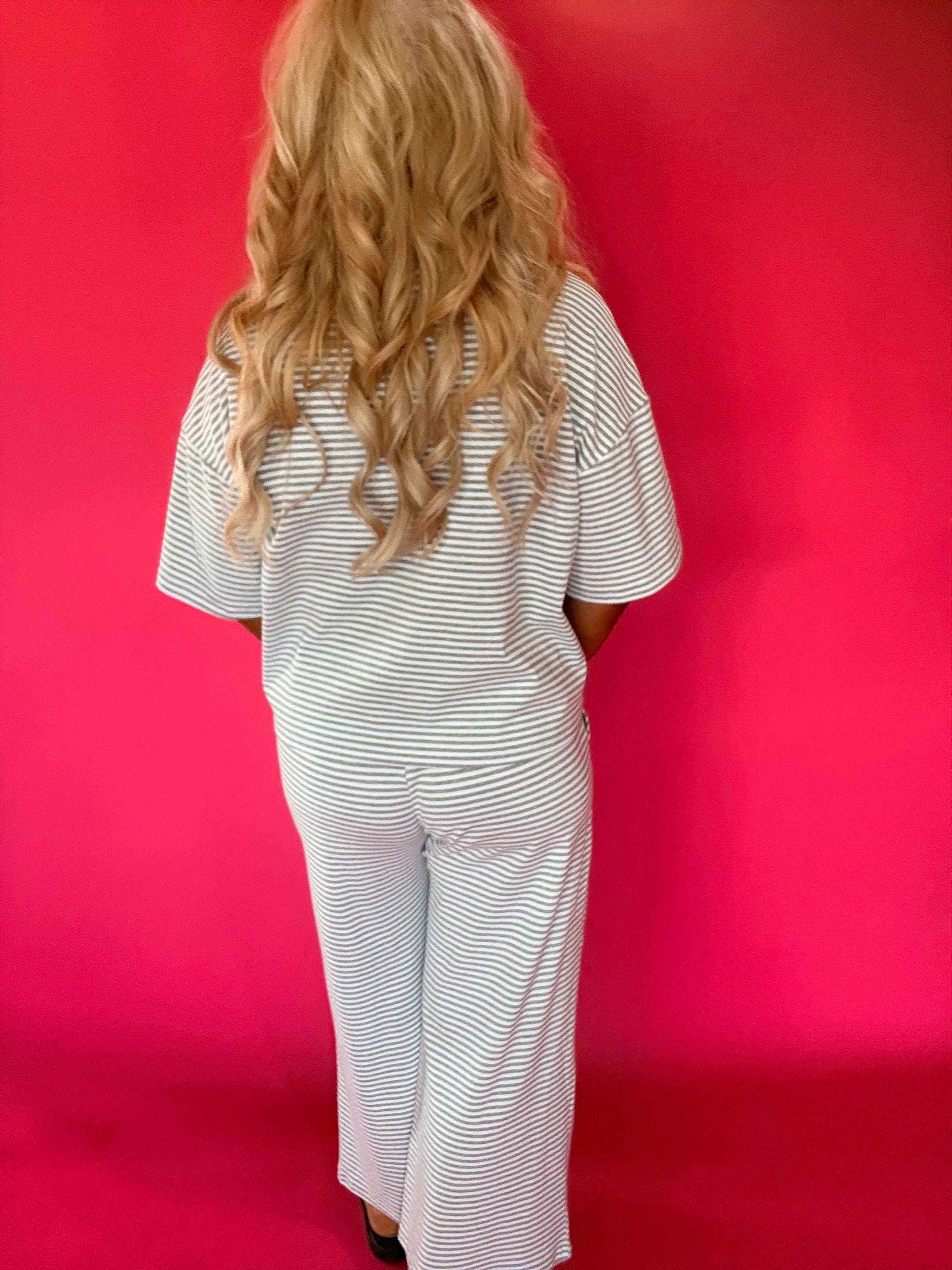 Full length view of the striped ribbed knit lounge set with a relaxed top and wide leg pants