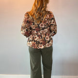 Floral peplum blouse styled with white denim and wedges for a fresh spring brunch look