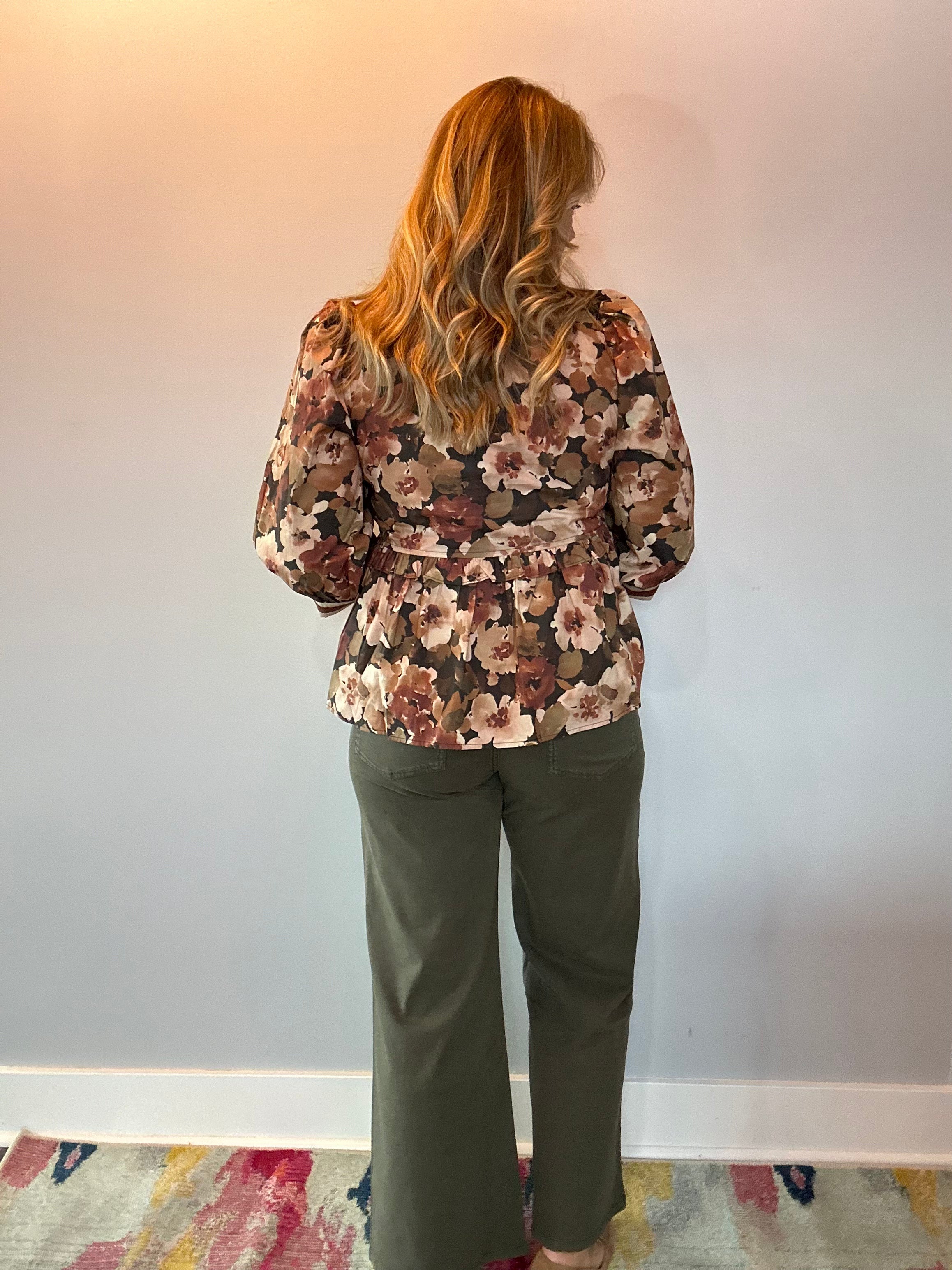 Floral peplum blouse styled with white denim and wedges for a fresh spring brunch look
