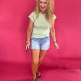 Back view of the light wash dad shorts showing the five pocket styling and the roomy thigh