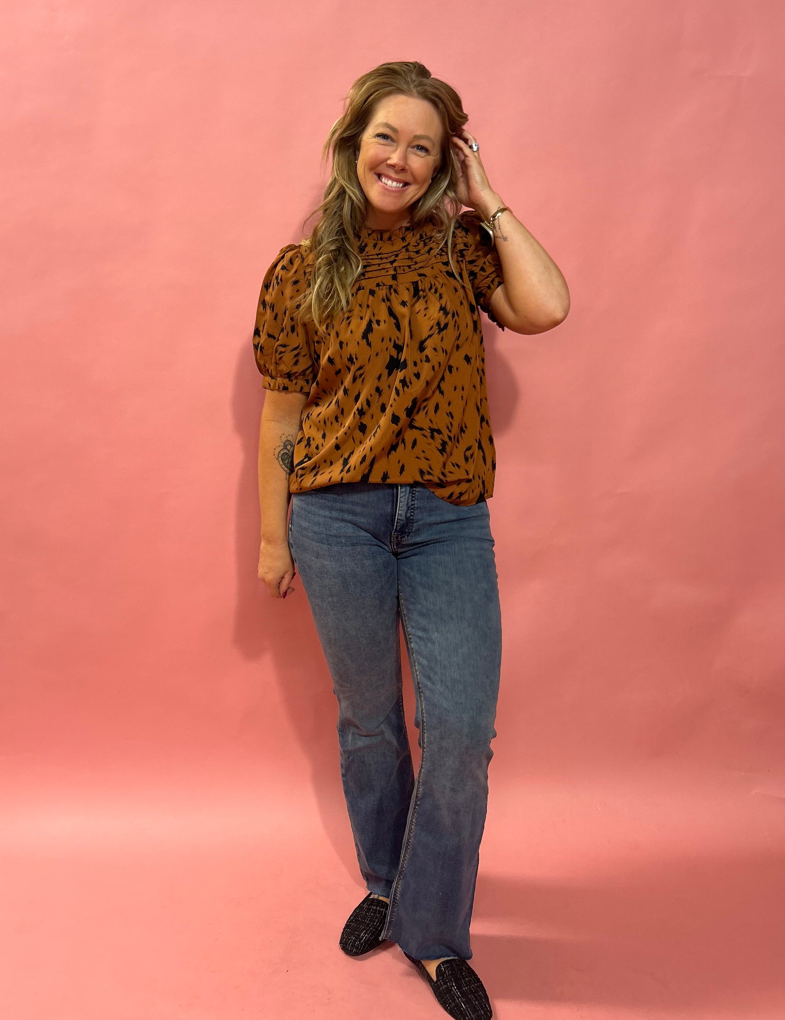 The Effortless Charm Cheetah Print Puff Sleeve Blouse