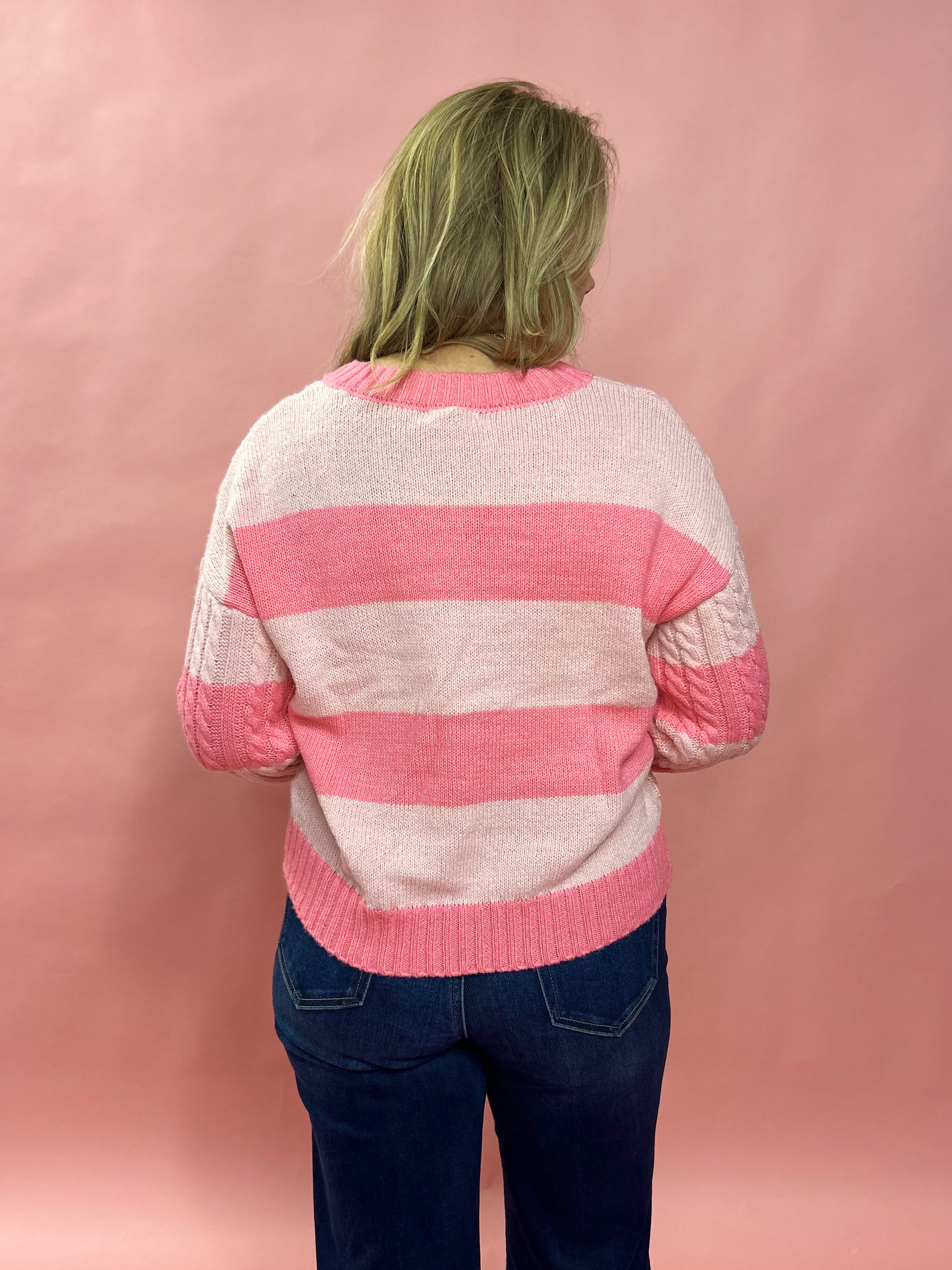 Close Embrace V-Neck Cable Knit Sweater in Pink