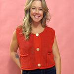 Cozy Charm: Red Sweater Vest with Oversized Buttons