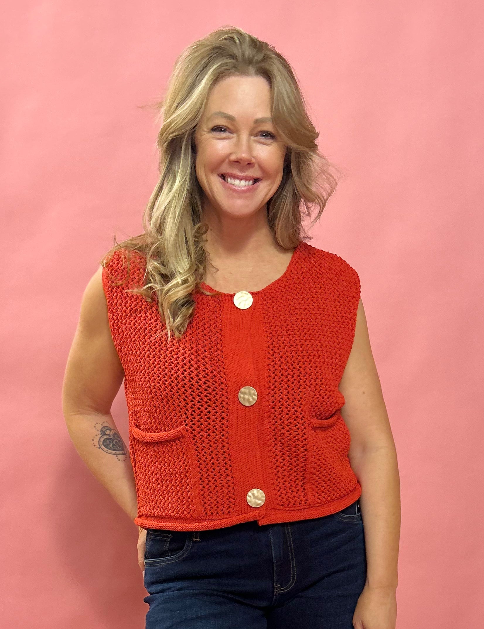 Cozy Charm: Red Sweater Vest with Oversized Buttons