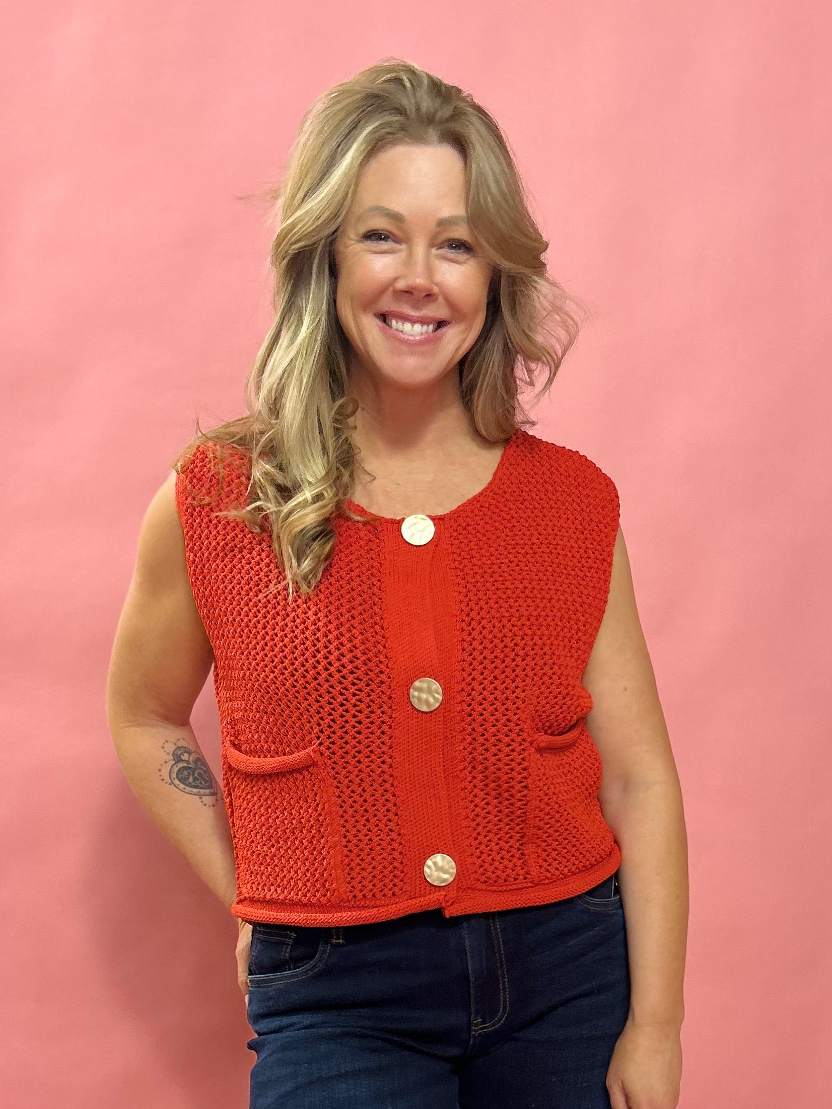 Cozy Charm: Red Sweater Vest with Oversized Buttons