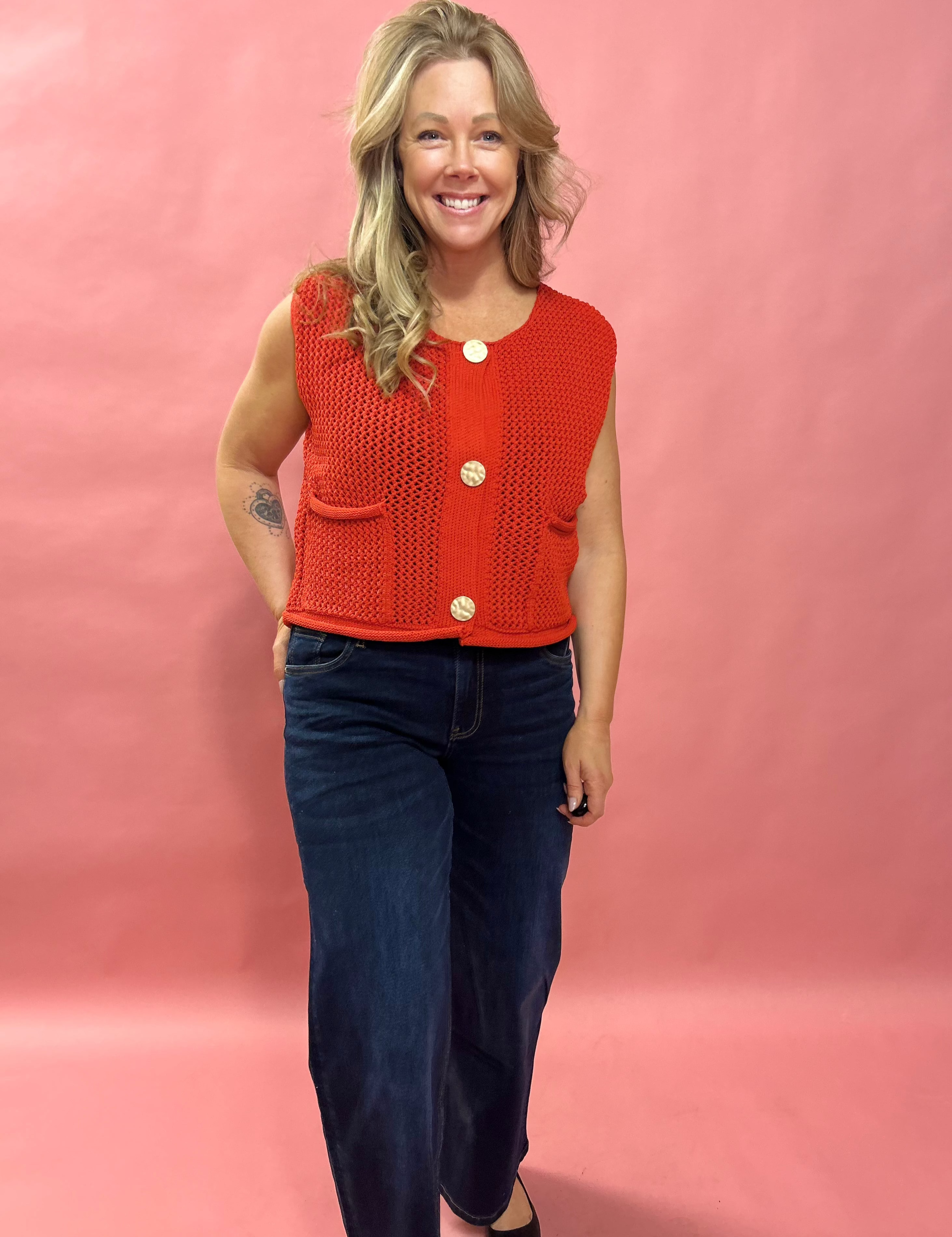 Cozy Charm: Red Sweater Vest with Oversized Buttons