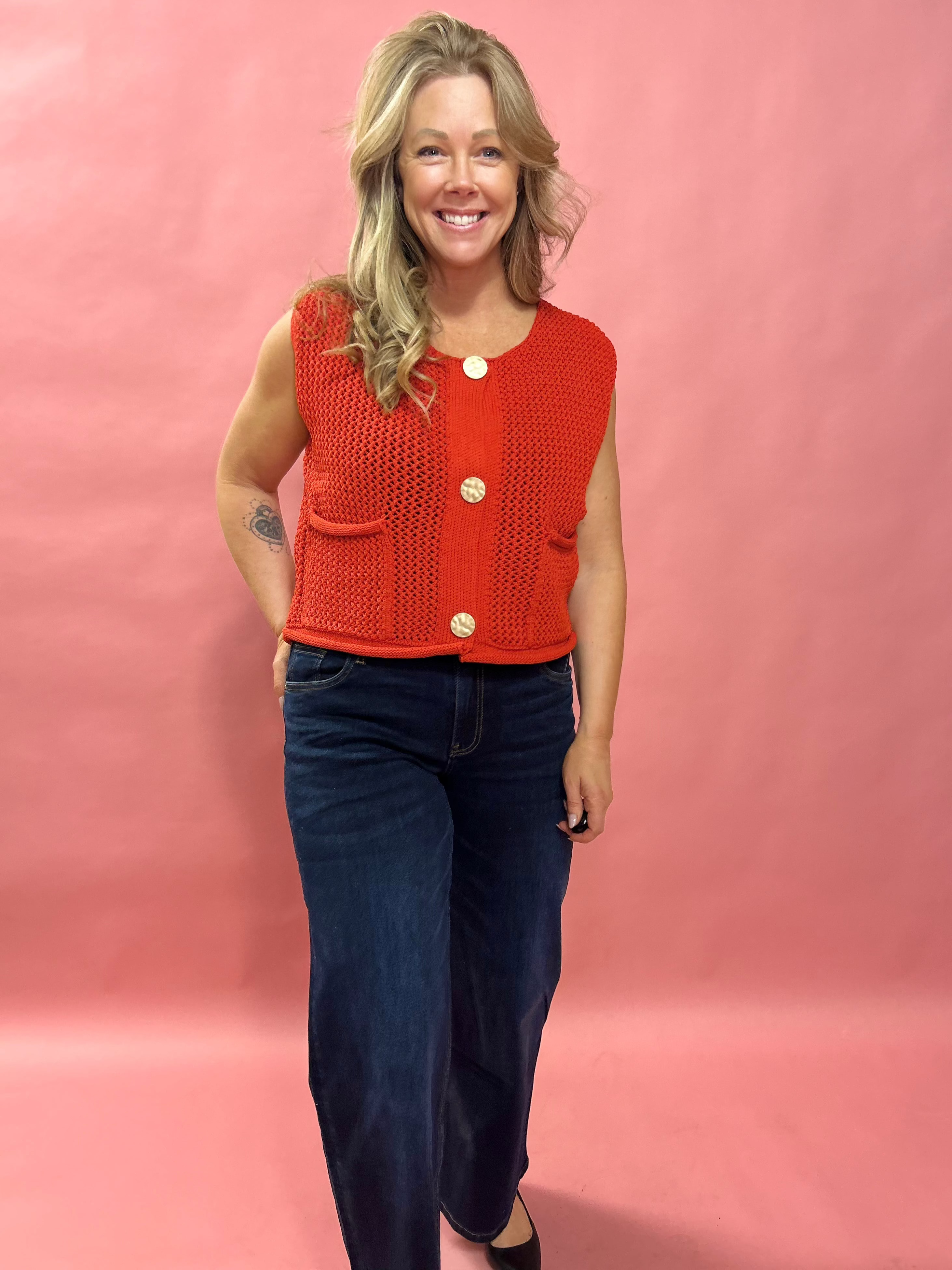 Cozy Charm: Red Sweater Vest with Oversized Buttons