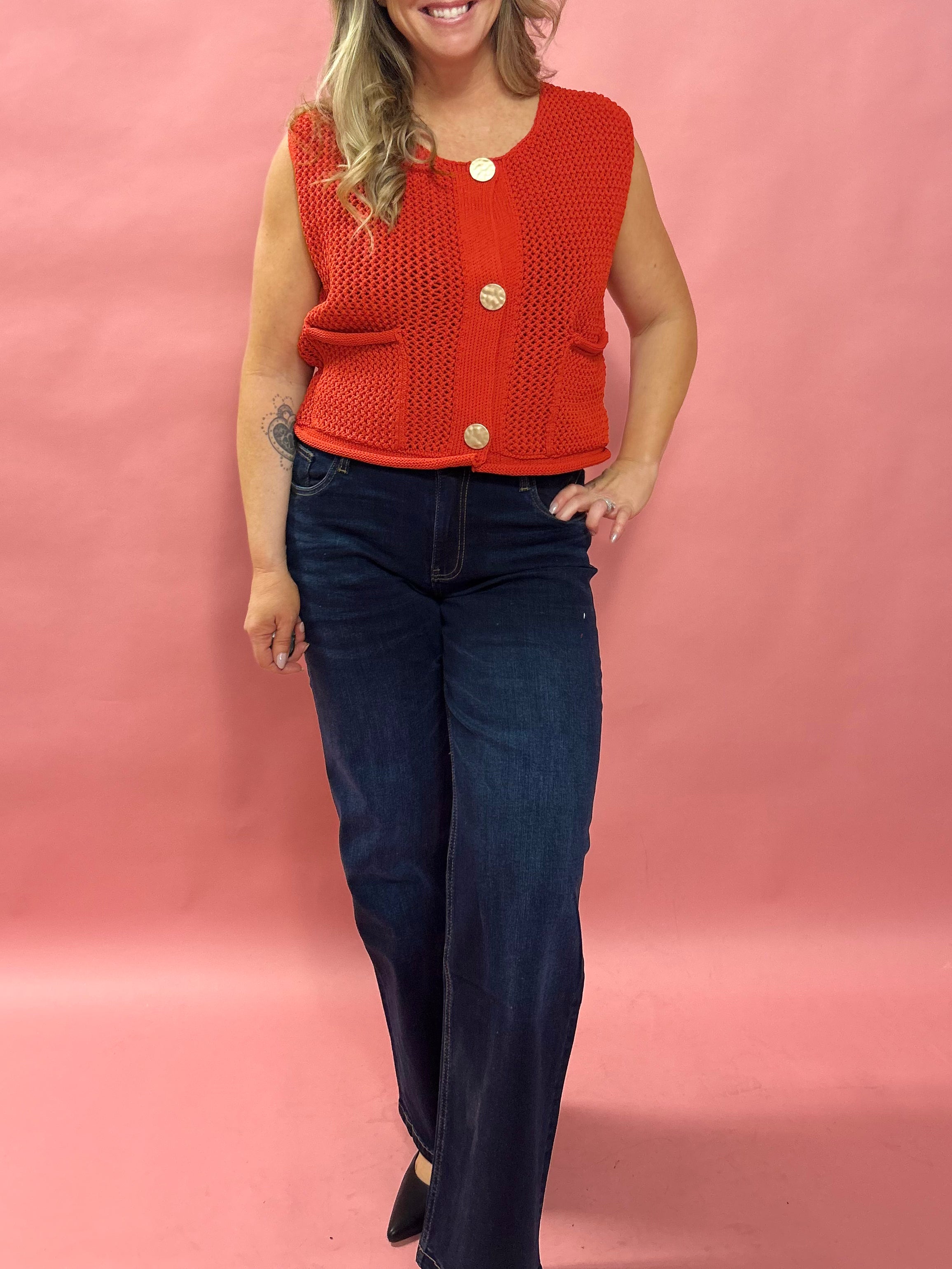 Cozy Charm: Red Sweater Vest with Oversized Buttons