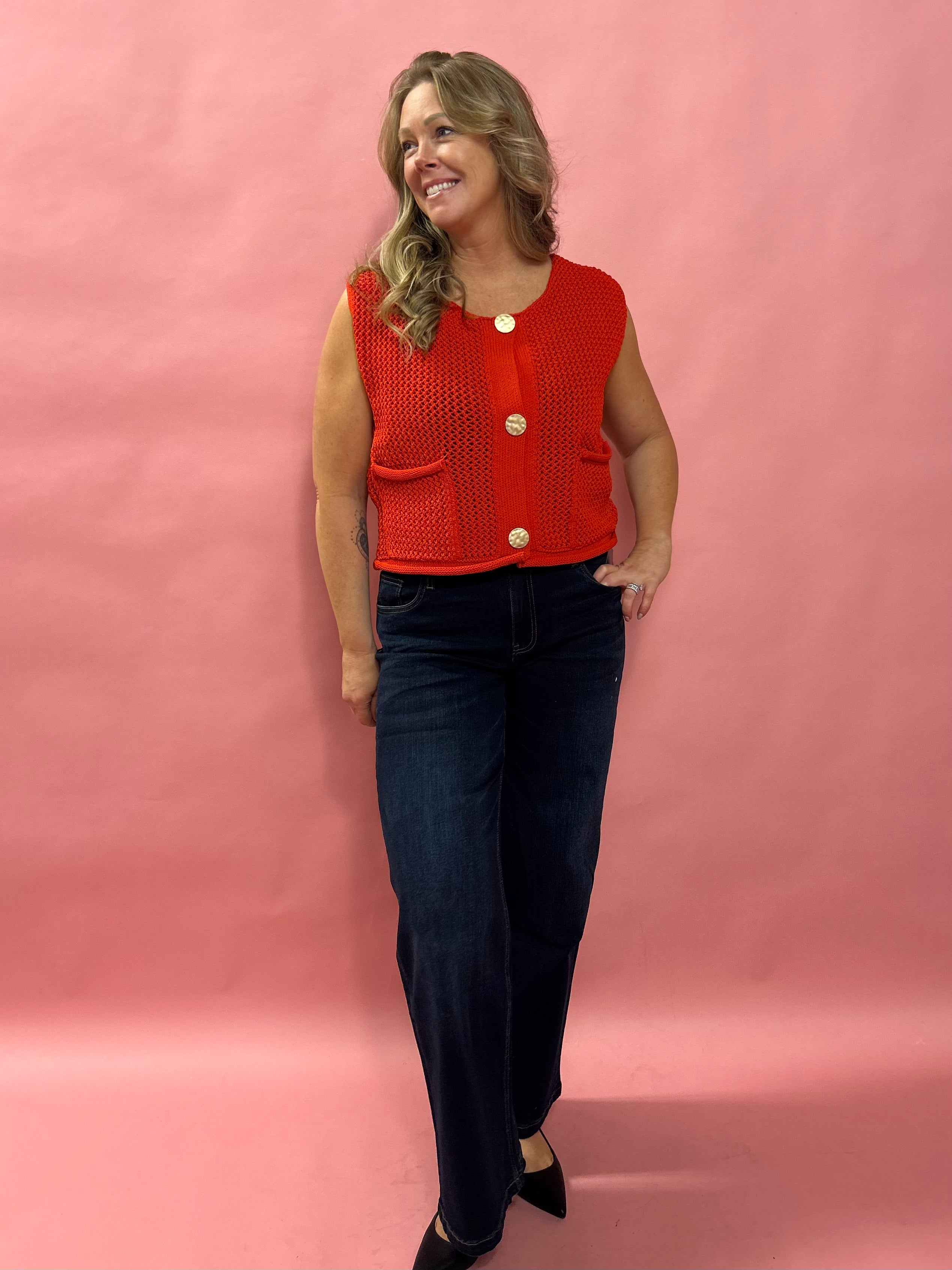 Cozy Charm: Red Sweater Vest with Oversized Buttons