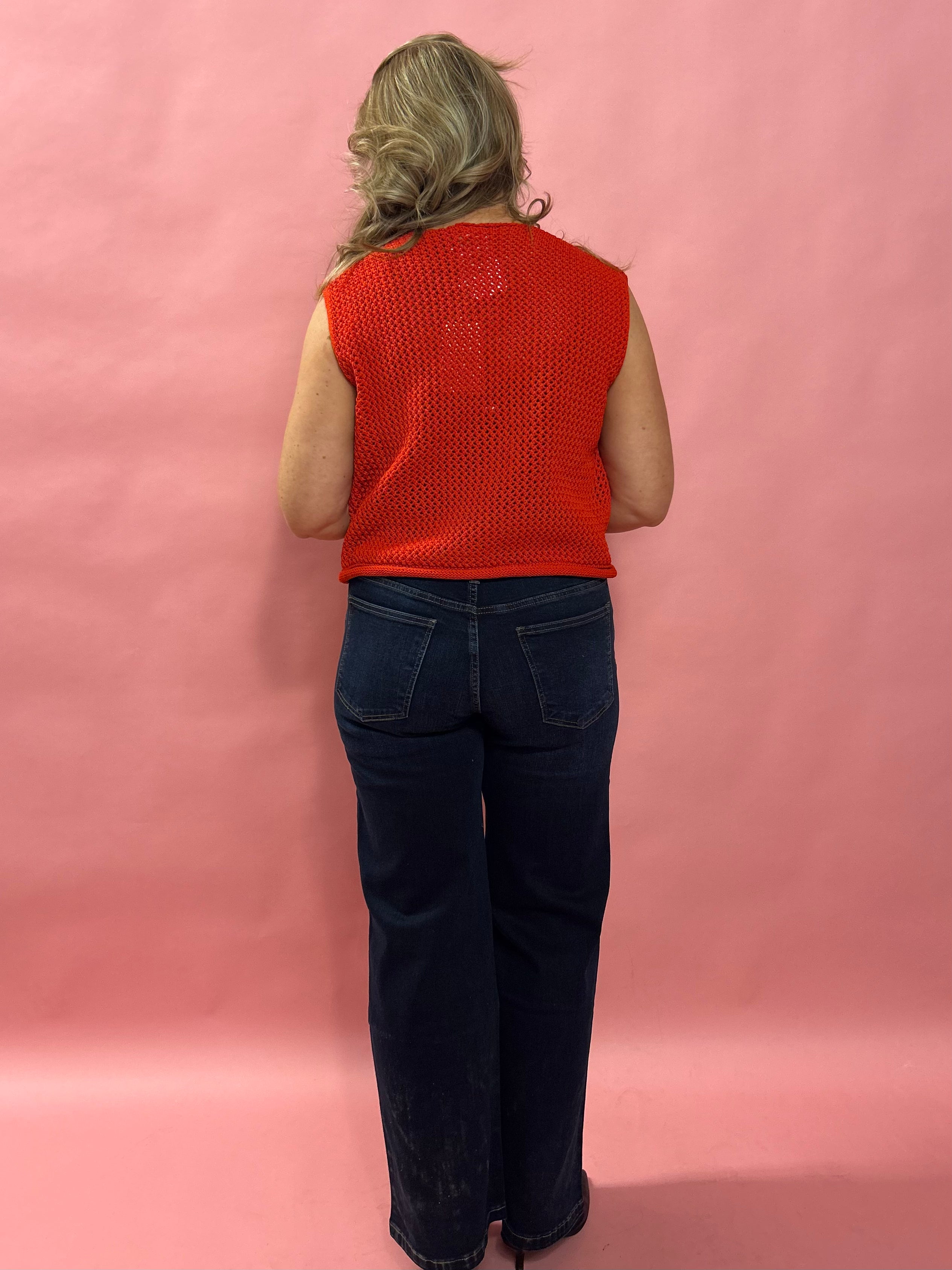 Cozy Charm: Red Sweater Vest with Oversized Buttons