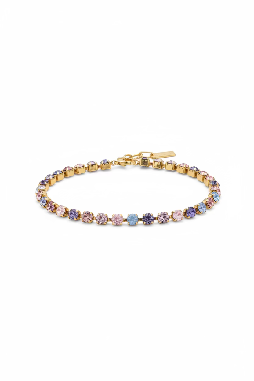 Stretch bracelet with 8mm crystal stones shading from pale to deep pink in antique gold