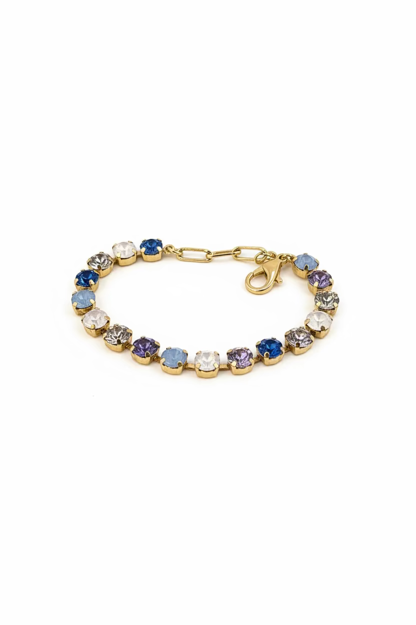 Side view showing the pink ombre Izzy bracelet stretched to fit around a model's wrist