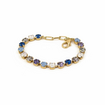 Side view showing the pink ombre Izzy bracelet stretched to fit around a model's wrist