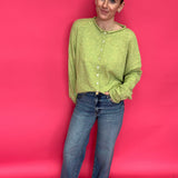 Close-up of the clean hem finish at the ankle on the high rise wide leg stretch denim jeans