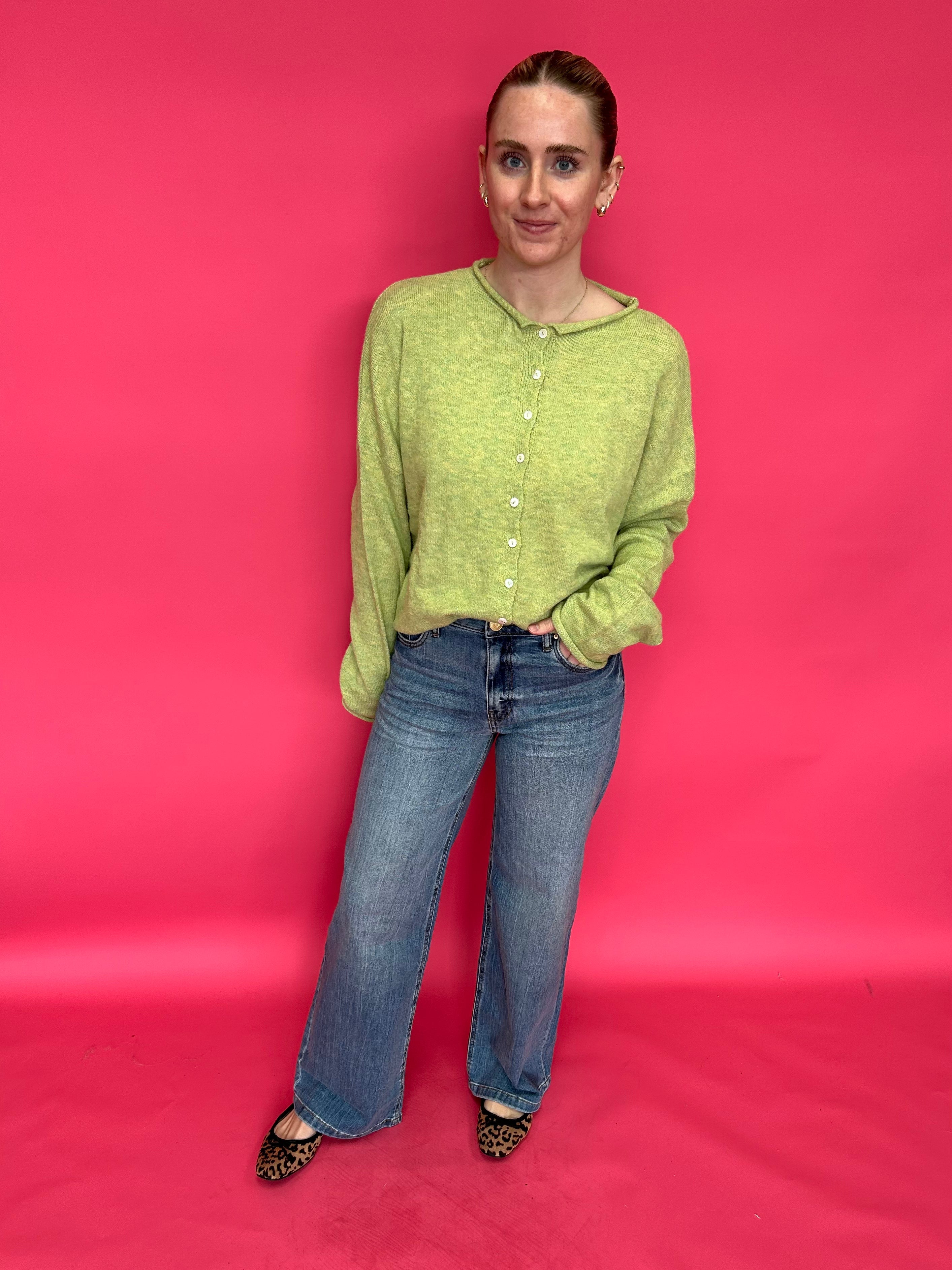 Detail of the Fab Ab front pockets and high rise waistband on the wide leg denim