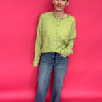 Flat lay of the high rise wide leg jeans showing the clean hem and the long 31 inch inseam