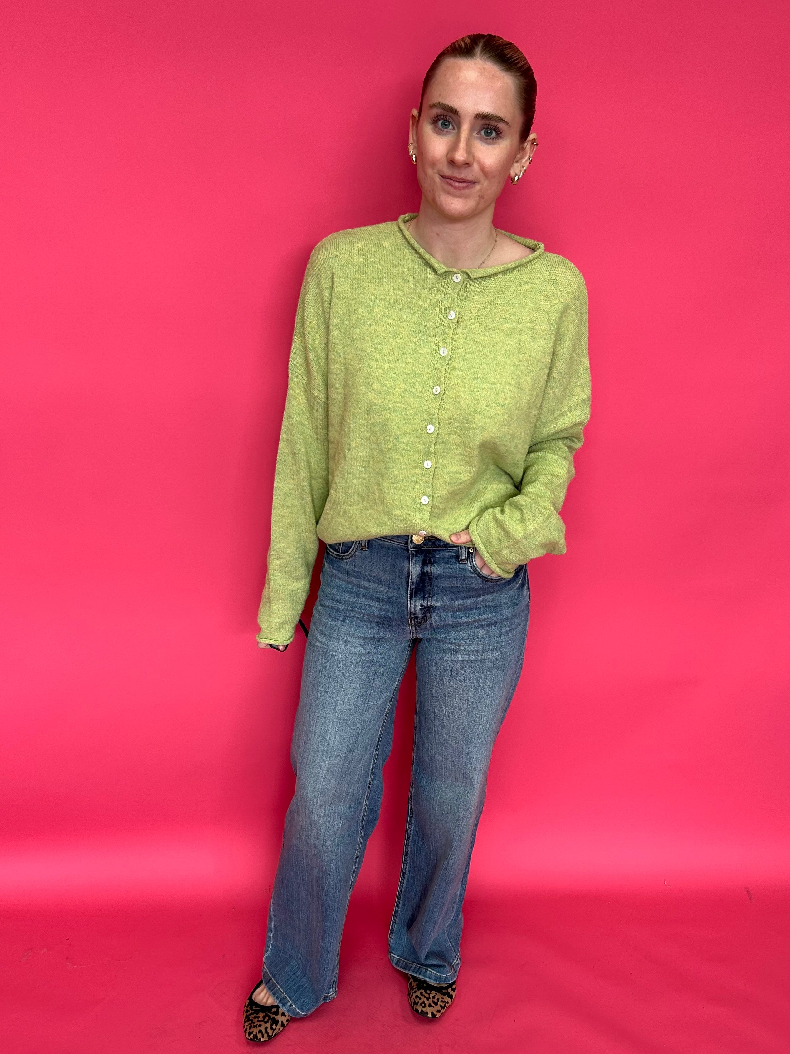 Flat lay of the high rise wide leg jeans showing the clean hem and the long 31 inch inseam