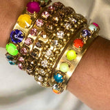 Side view showing the open back and 2.5 inch diameter of the blue Kelly cuff bracelet