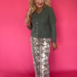 Back view of the green Medina pointelle cardigan showing the relaxed drape and ribbed trim