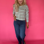 Back view of the Curator wash wide leg jeans showing the mid rise waist and 23 inch leg opening