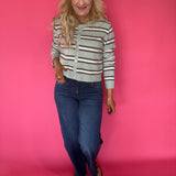 Back view of the Curator wash wide leg jeans showing the mid rise waist and 23 inch leg opening