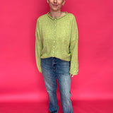 Back view of the determin wash straight leg jeans showing simple back pockets and a long inseam