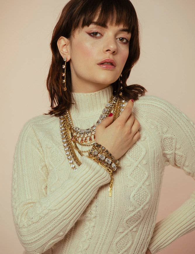 Close-up of the clear crystal line and antique gold setting on the Monique bracelet