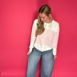 Close-up of the non distressed medium wash denim used on the Nori wide leg trouser jeans