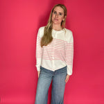 Back view of the medium wash wide leg trouser jeans showing the long clean leg line