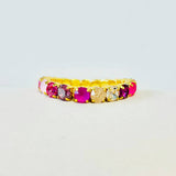 Oakland stretch bracelet in a pink mix of crystals set in antique gold plated brass on a wrist