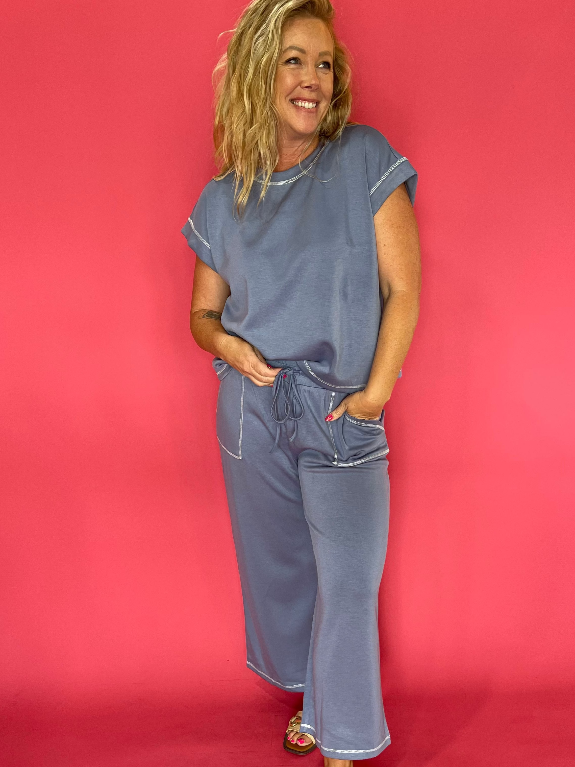Side view of the matching lounge set showing the side pocket and drawstring waistband