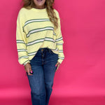 Close-up of the clean hem finish at the ankle on the high rise straight leg jeans