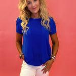 Prim And Proper Front Pleat Short Sleeve Top in Blue