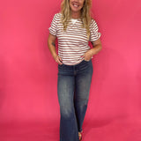 Back view of the striped puff sleeve top showing the slightly relaxed body and ribbed hem