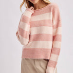 Detail of the ribbed hem along the bottom of the brown and sky blue striped boatneck sweater