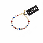 Close-up of the mixed red, white, and blue stone pattern on the Sarina stretch bracelet